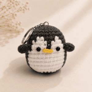 Grey Penguin Crochet Charm Keychain - Image 1